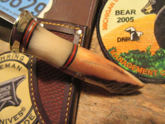 South  Dakota Caper Artifact Ivory Ice axe with Musk Ox.