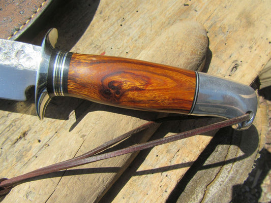 J. Behring Handmade DBL Skull Fighter Hammermark Ironwood with aluminum crows beak butt.