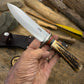 Treeman 6" Drop Point Hunter AEB-L stainless . NS Stag Mammoth