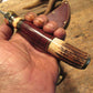   Big Six 6" Hunter Drop Tine sambar Stag Horsehide brass guard and butt cap. 