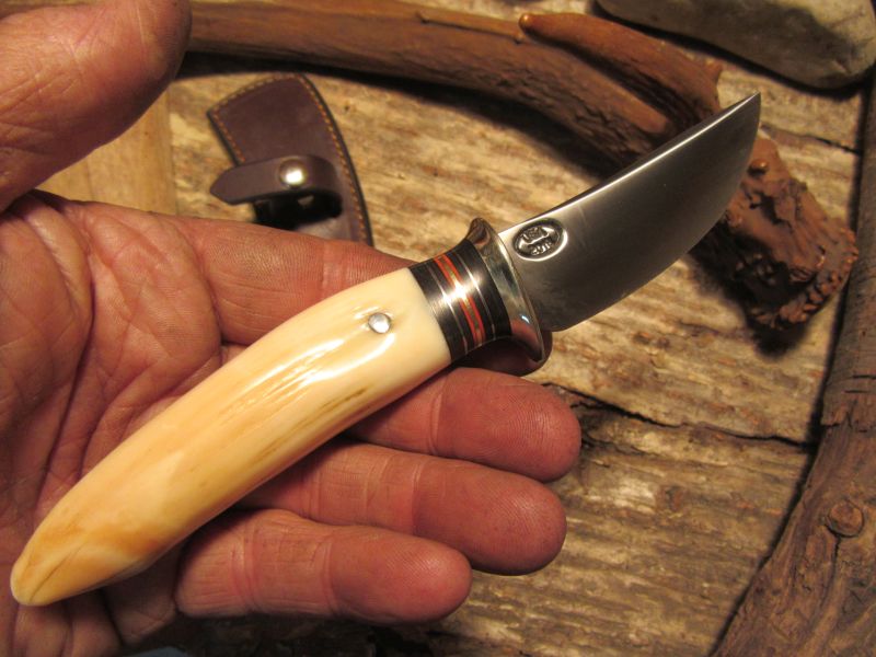  J. Behring Handmade Hippo Tooth Caper  