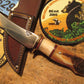         South  Dakota Caper Artifact Ivory Ice axe with Musk Ox.     
