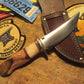         South  Dakota Caper Artifact Ivory Ice axe with Musk Ox.     