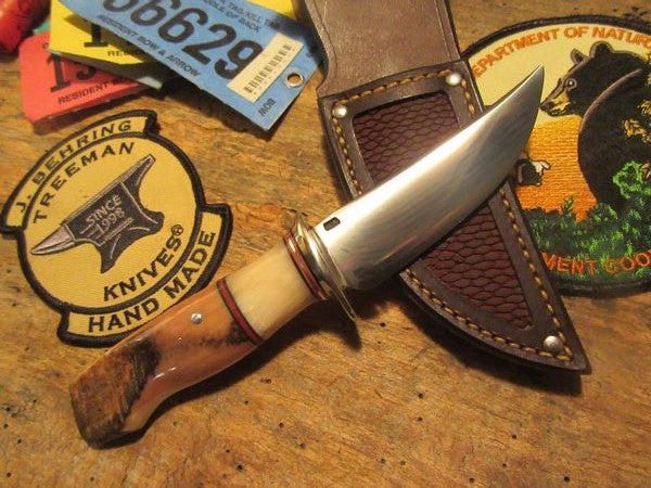         South  Dakota Caper Artifact Ivory Ice axe with Musk Ox.     