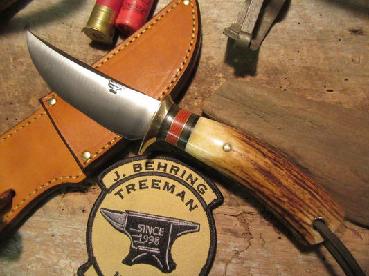  J. Behring Trout and Deer Sambar Stag with lined Thong hole
