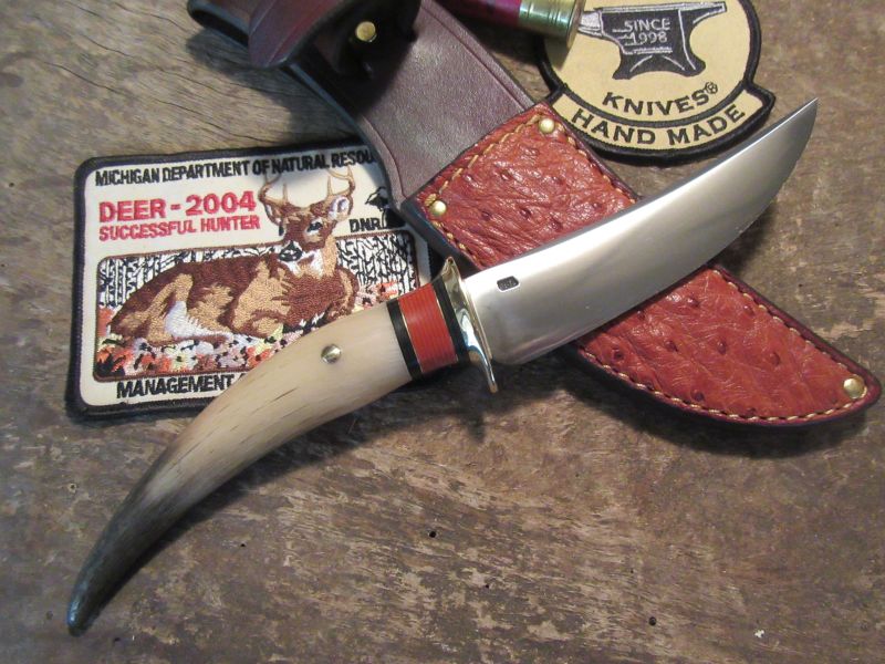 J. Behring Deer & Trout Musk Ox Horn tine with Ostrich sheath 