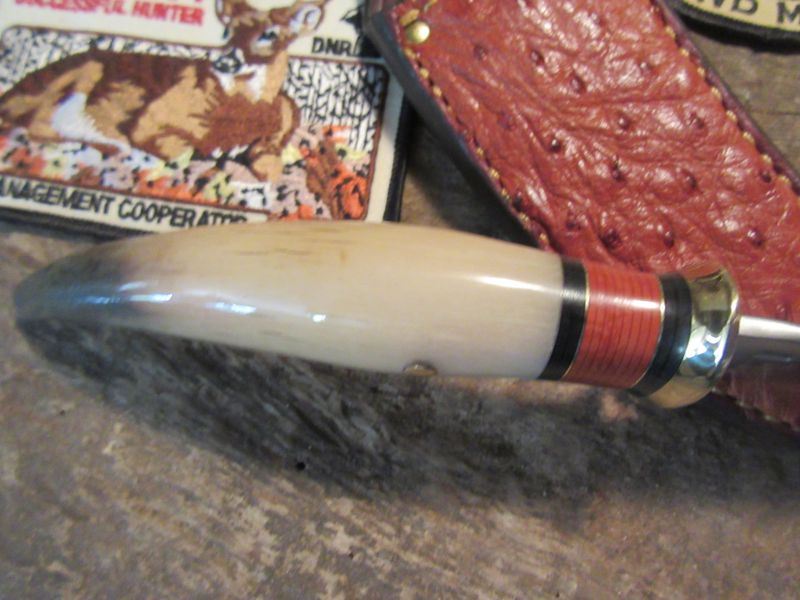 J. Behring Deer & Trout Musk Ox Horn tine with Ostrich sheath 