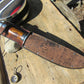 J. Behring Handmade DBL Skull Fighter Hammermark Ironwood with aluminum crows beak butt. 